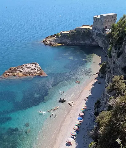 Exclusive chauffeur service to the hidden beach and crystal waters of Erchie.